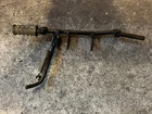 Kawasaki KV75 Foot Peg Mount Kick Stand Spring Bracket Used. Price: $70.00.