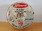Vintage Wizard Plastic Electrical Tape Tin Western Auto Supply Company Used. Price: $20.00.
